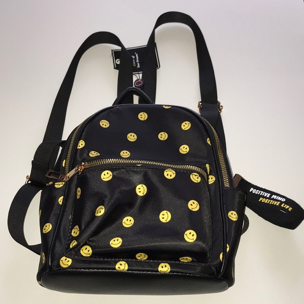 Yellow smiley face backpack